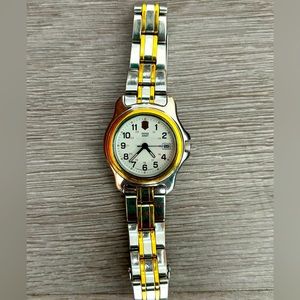Swiss Army watch. Stainless steel, two-tone. Needs a battery. Great condition!